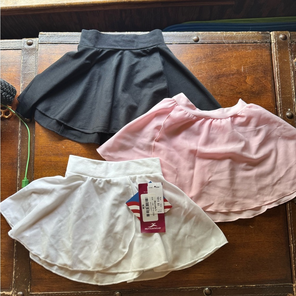 Motionwear Black, Pink, and White Mini Skirt Trio